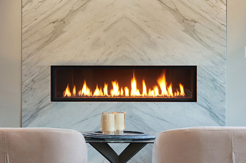 Chairs in front of fireplace